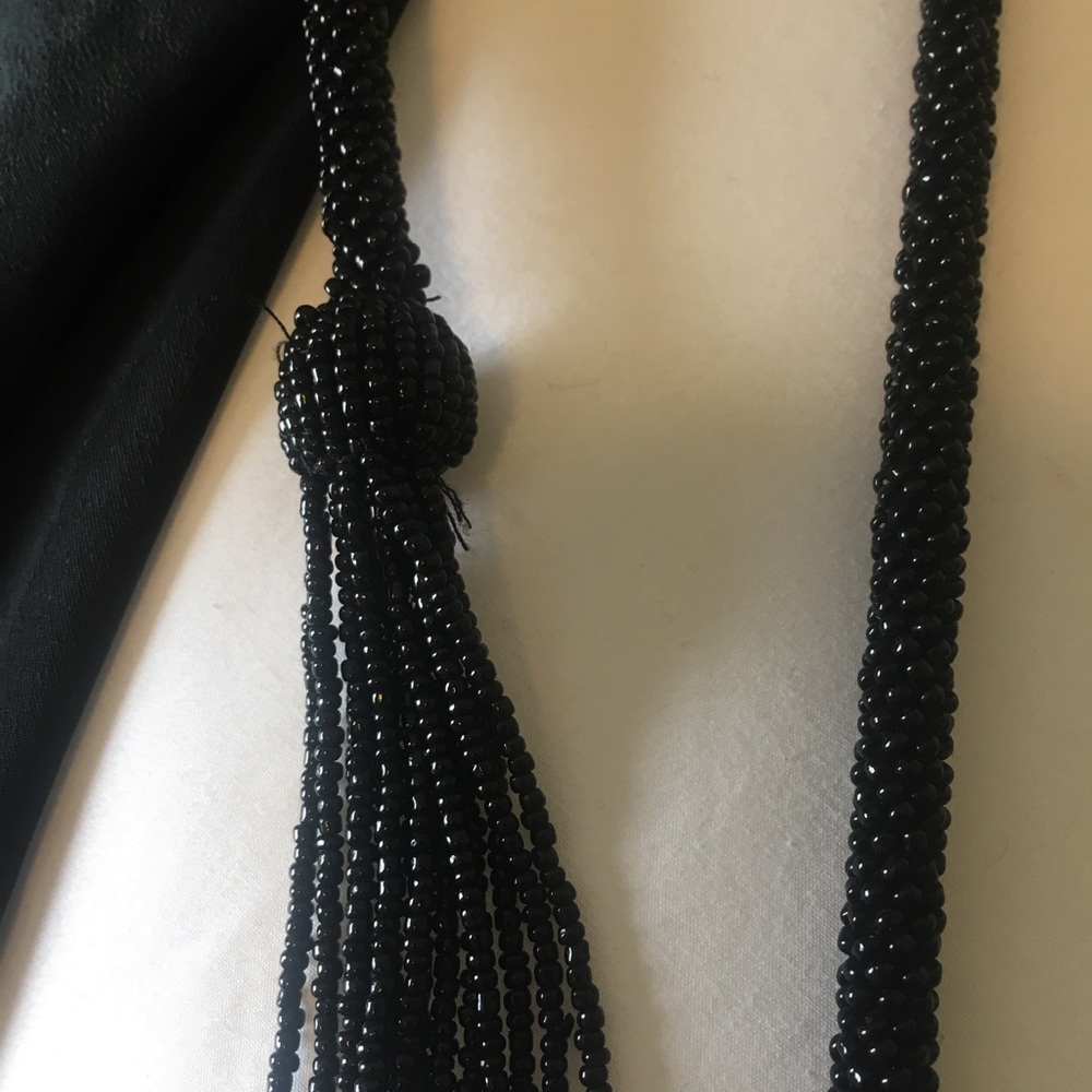 Black silk dress with beaded tassels